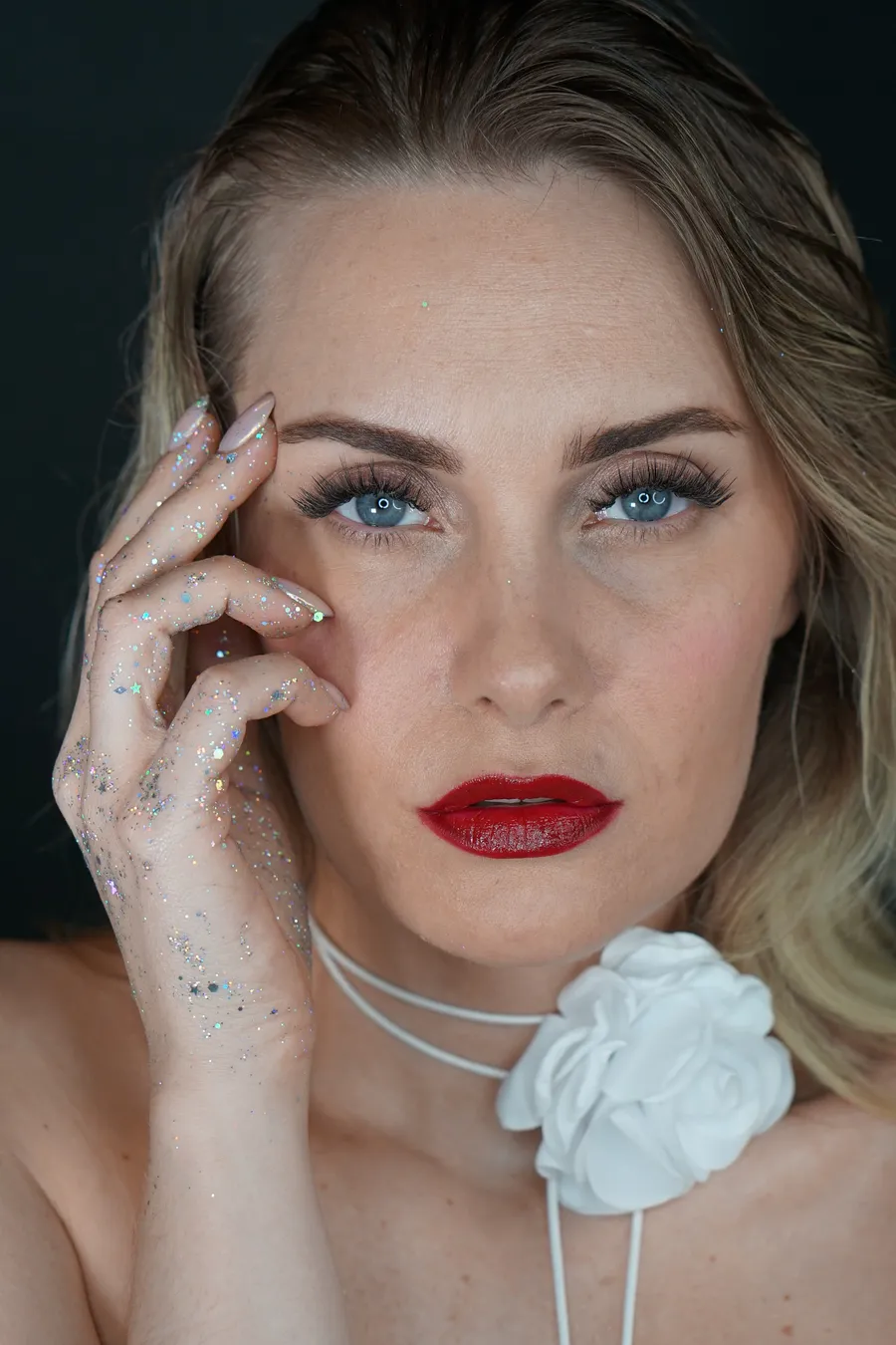Close-up of a woman wearing full, fluffy Russian Volume lash extensions